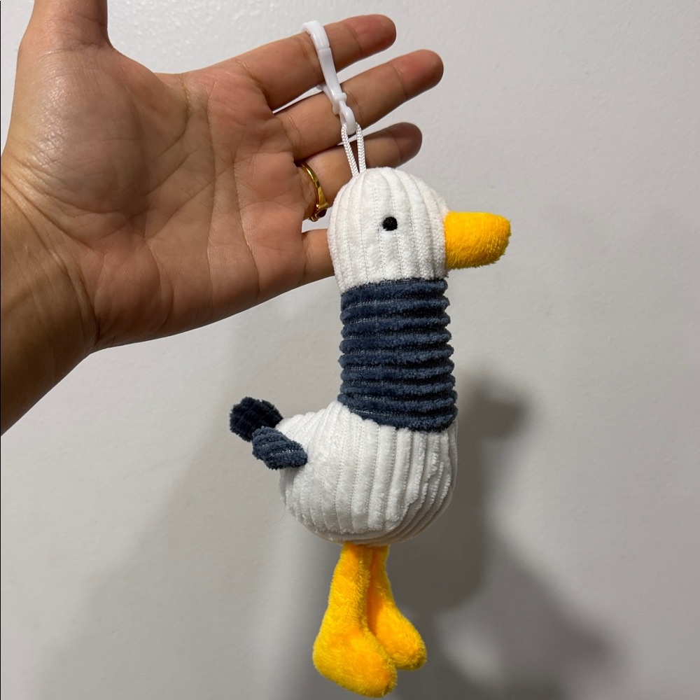 corduroy plush duck keychain, also described as a bag charm or pendant 5"